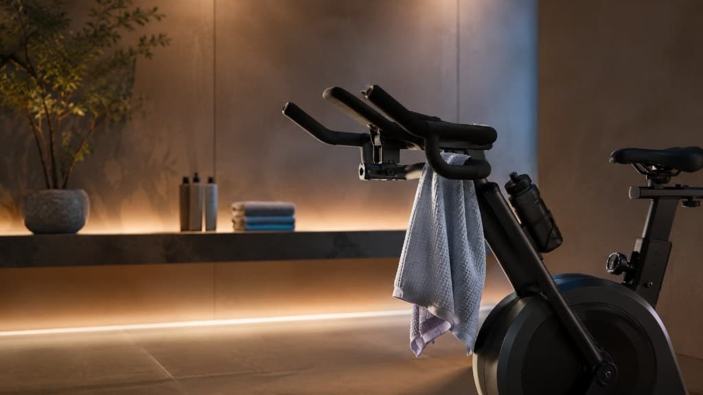 Matte black spin bike in a modern training space